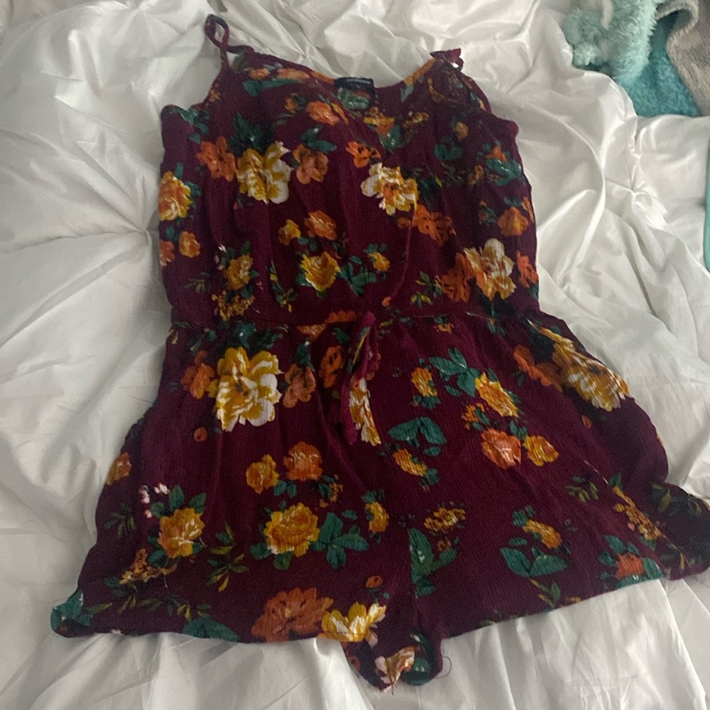 An floral wine red jumpsuit